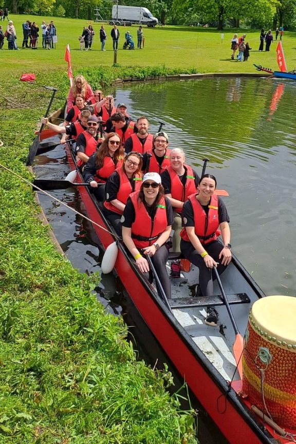 Marston’s Dragon Boat Race team in their boat