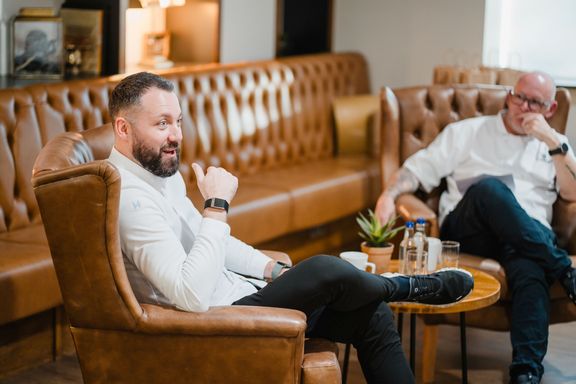 Tom Shepherd seated while at a Q&A event