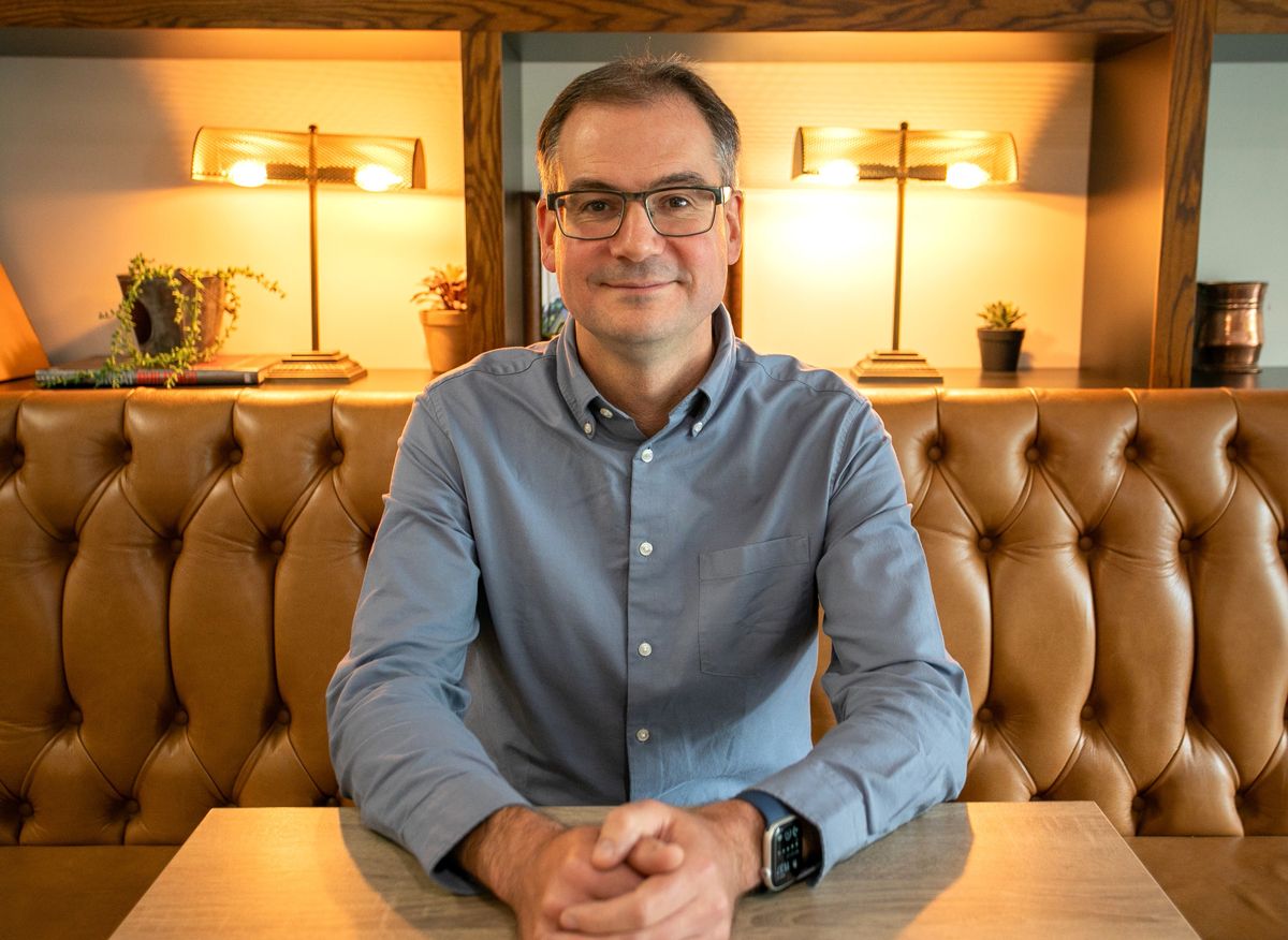 Stephen Hopson sitting at a table