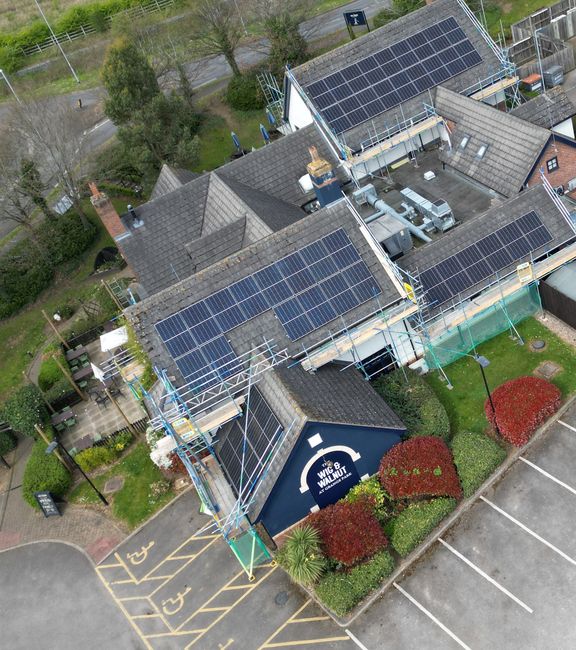 Aerial photo of Wig & Walnut pub showing solar panels on roof