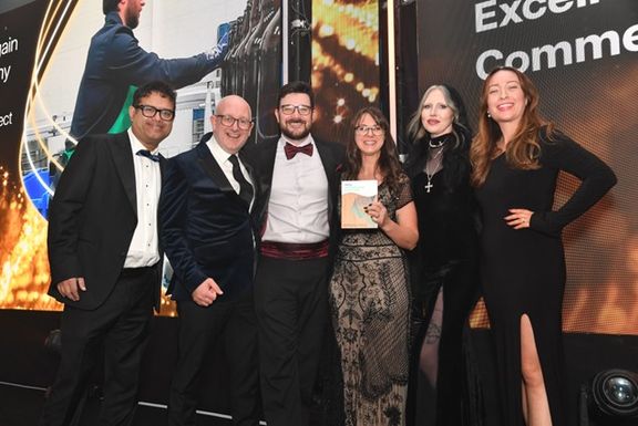 Team receiving recycling award